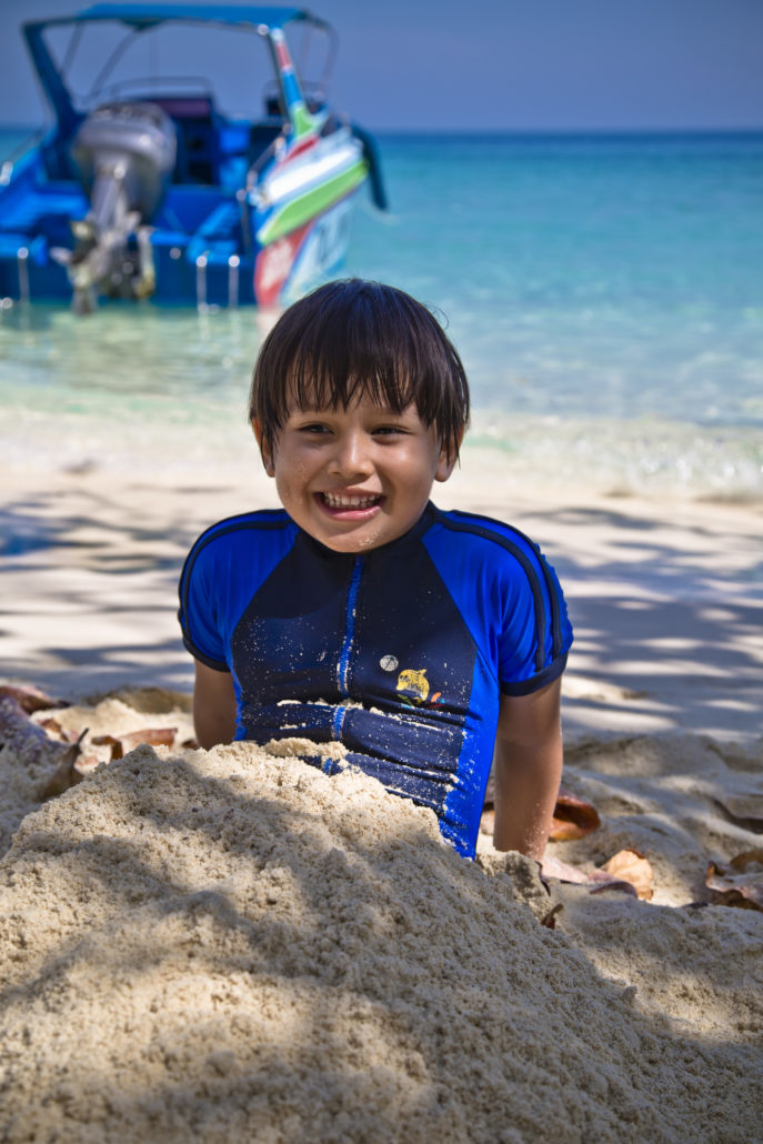 Boy in sand on the beach