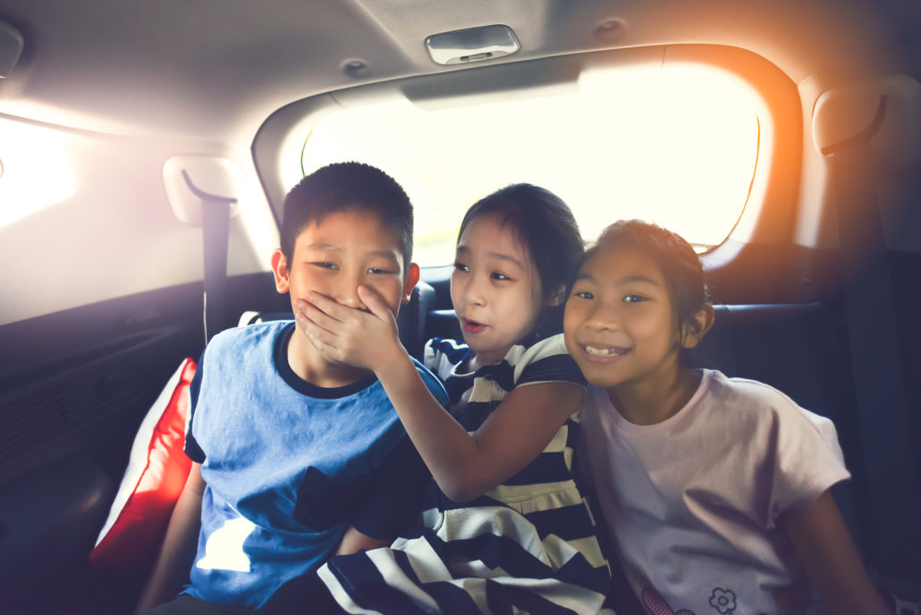 Kids on road Trip in backseat