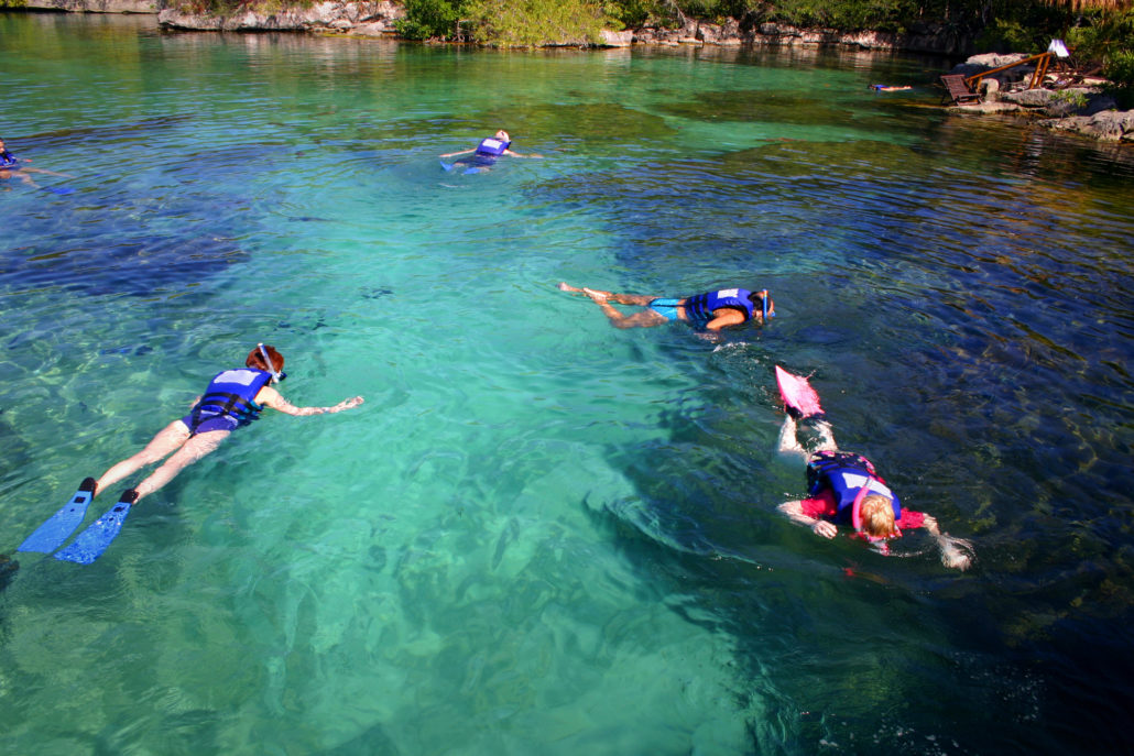 Group of tourists snorkeling in Mexico