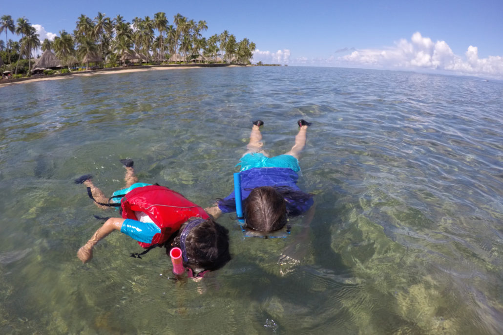 mother and daughter snorkeling in Fiji