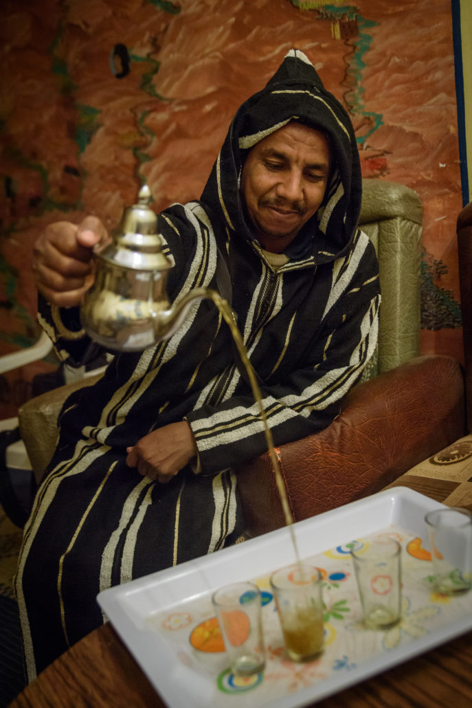 Man preparing mint tea in Morocco