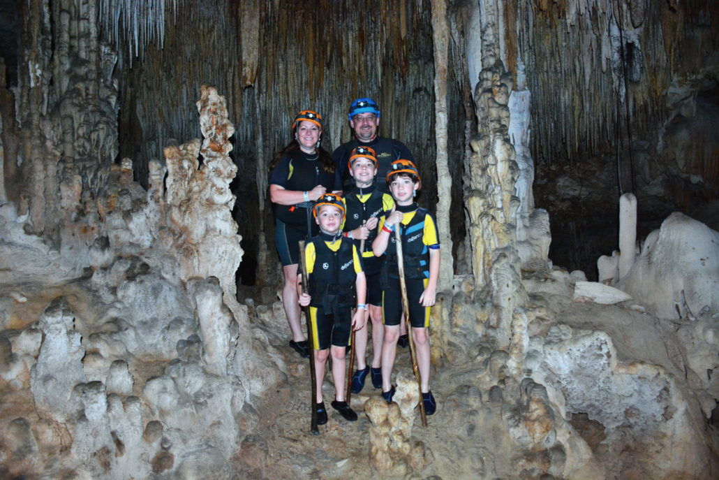 Thibault family traveling through caves with Magical Storybook Travels