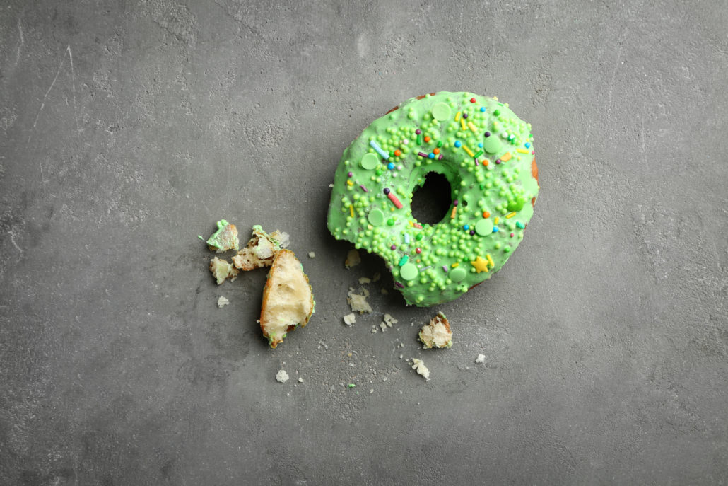 Green donut with sprinkles