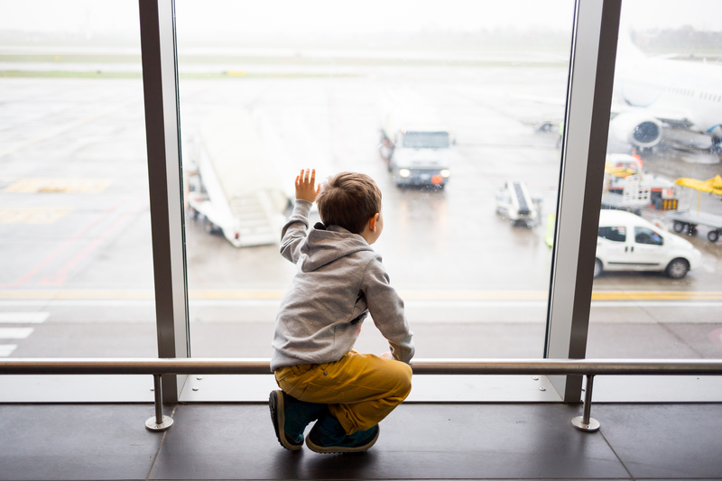 Kid waiting in airport