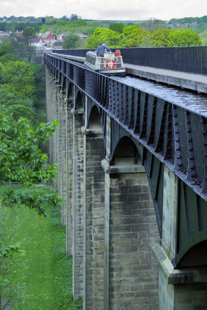 Holiday barge crossing the Pontcysylite Aqueduct on the Llangollen Canal, Wales