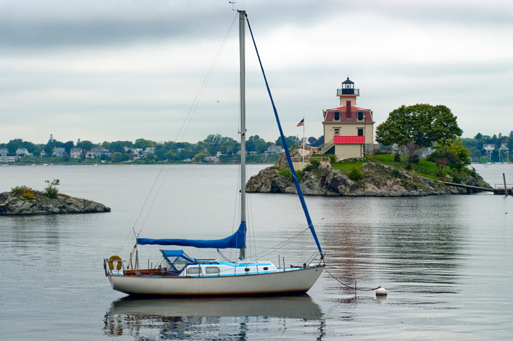 Sailboat Moored Near Lighthouse in Providence Rhode Island