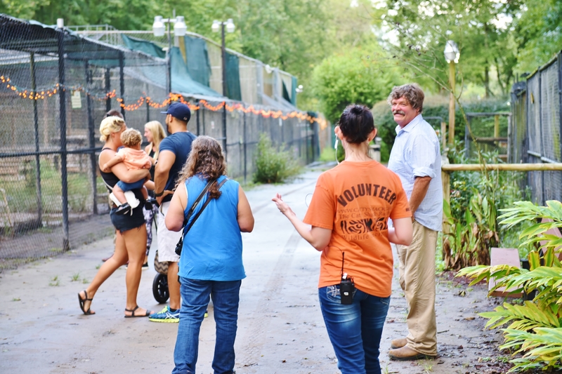 Florida catty shack wildlife sanctuary volunteer with visitors 