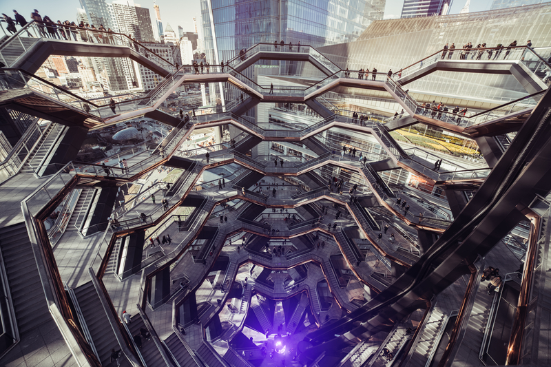 Modern architecture building Vessel spiral staircase is the centerpiece of the Hudson Yards in New York City. 