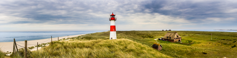 The lighthouse List Ost on the Ellenbogen of the island Sylt at the German northern sea coast. 